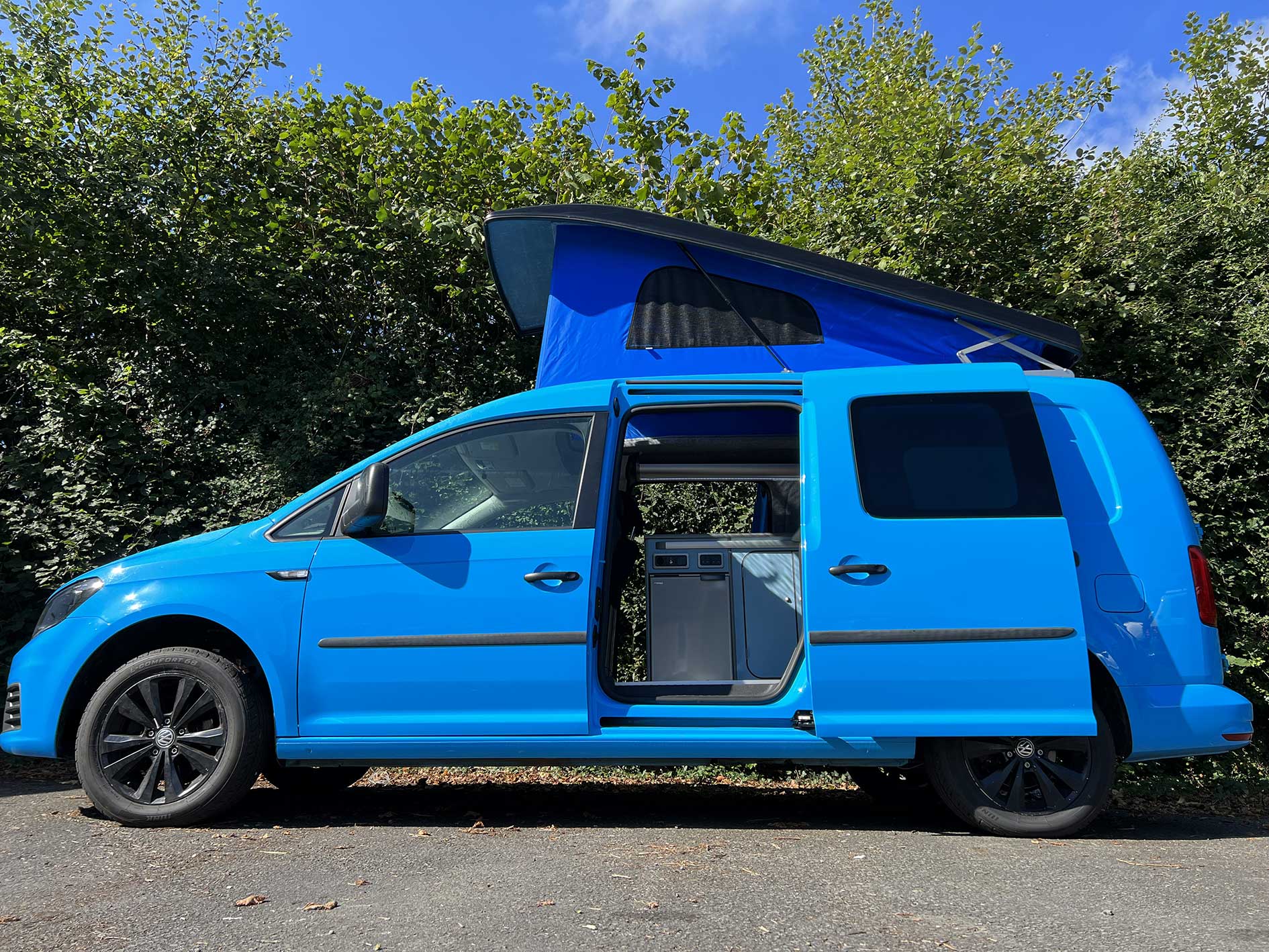 bright blue camper van conversion