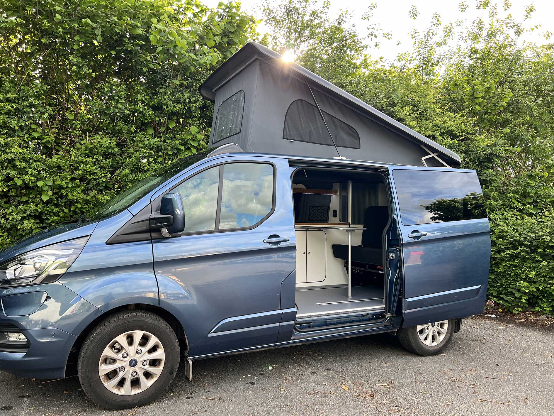LT Conversions camper conversion with pop up roof