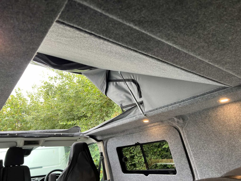 example of a skylight in camper van conversion pop-up roof