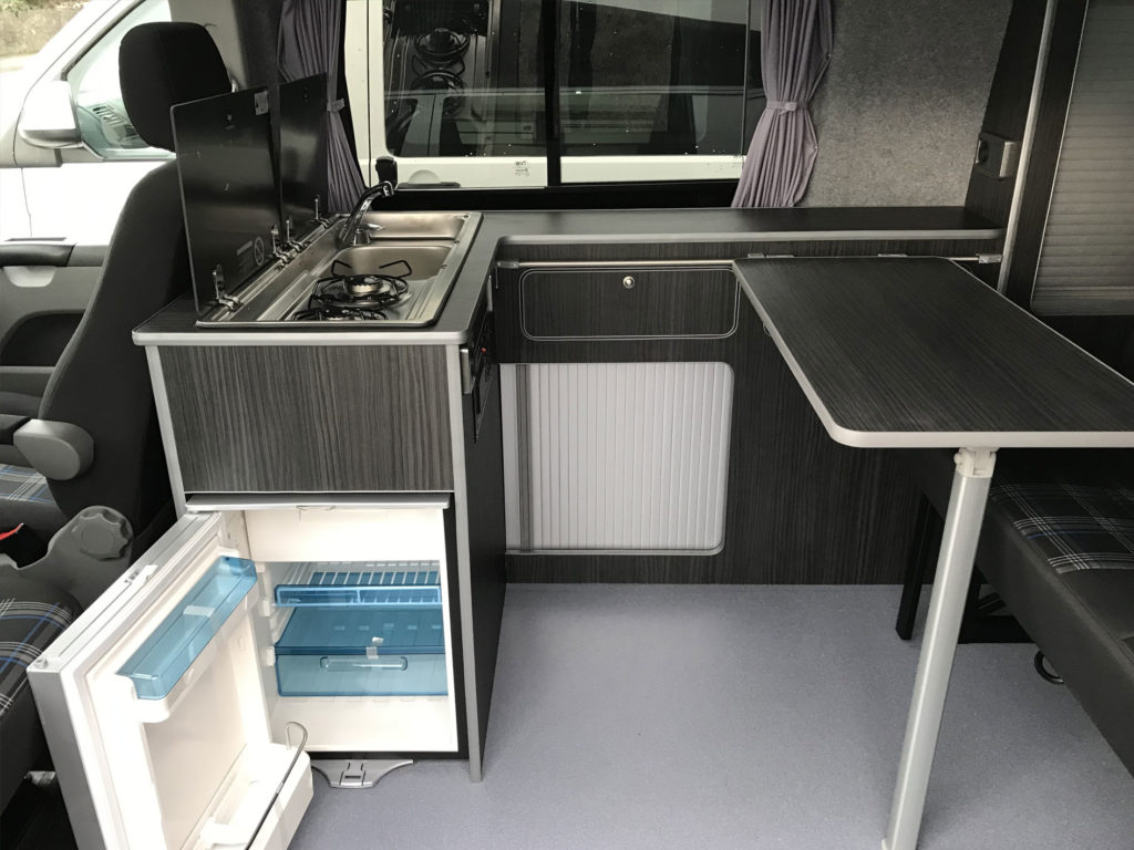 drake camper van conversion with dark grey interior