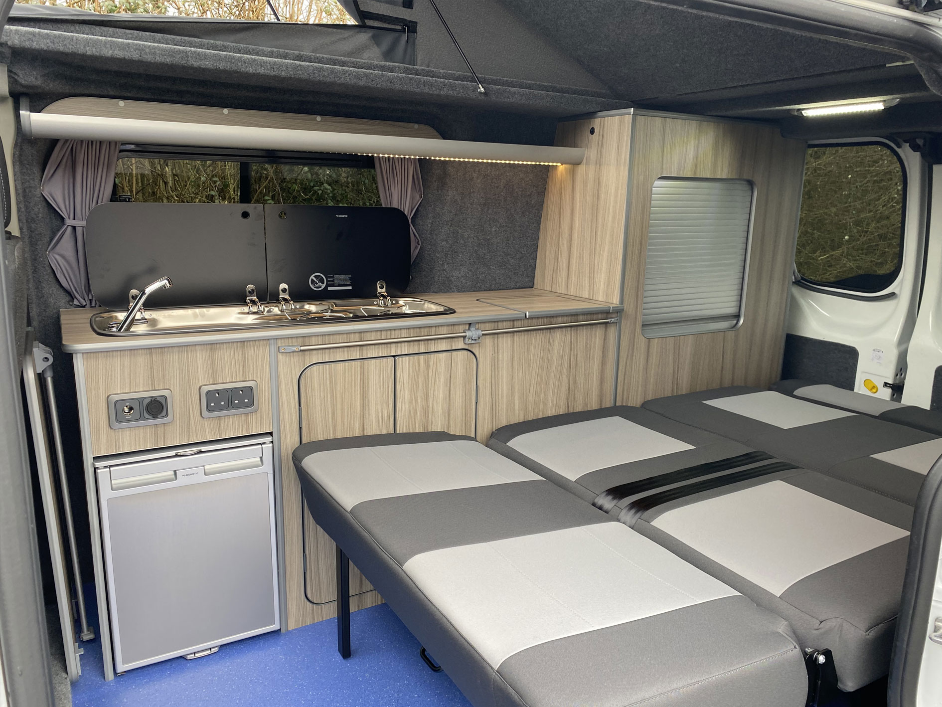 camper van conversion with bed opened